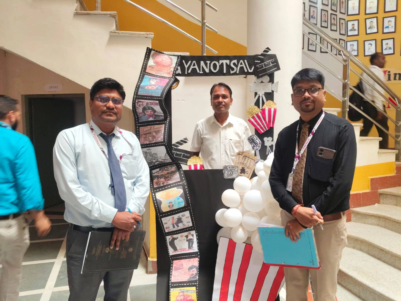 Faculty at the Gyanotsav themed photo-frame stall